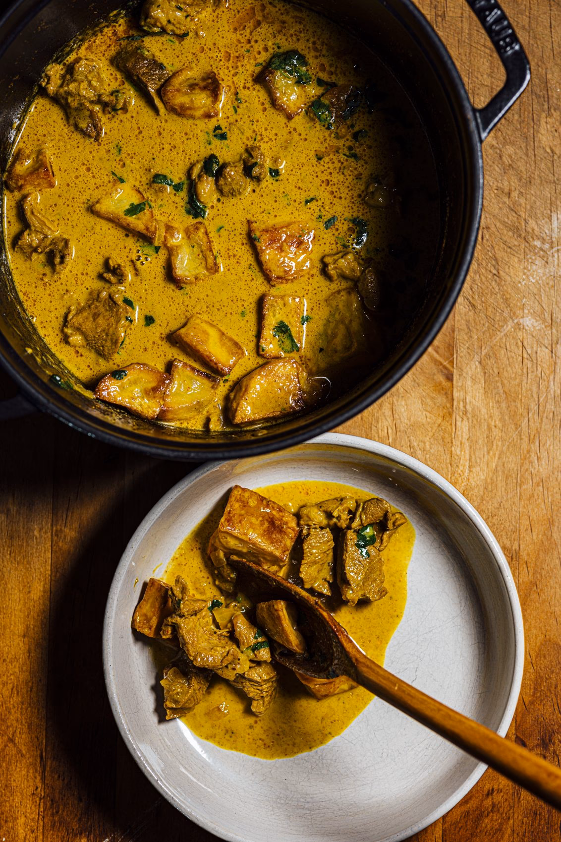 What is a 'bone in' lamb curry?