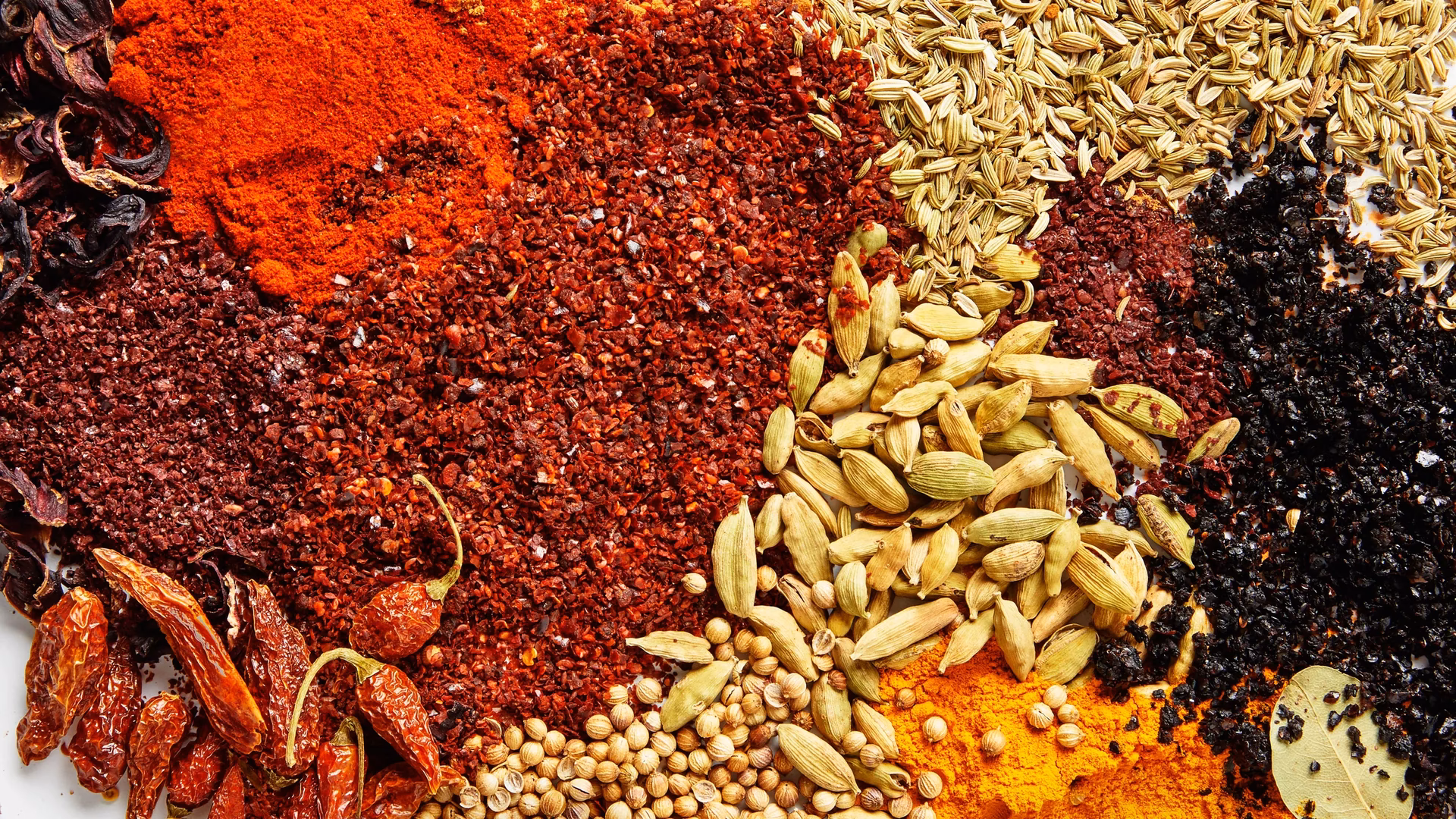 What spices should be ground before cooking?