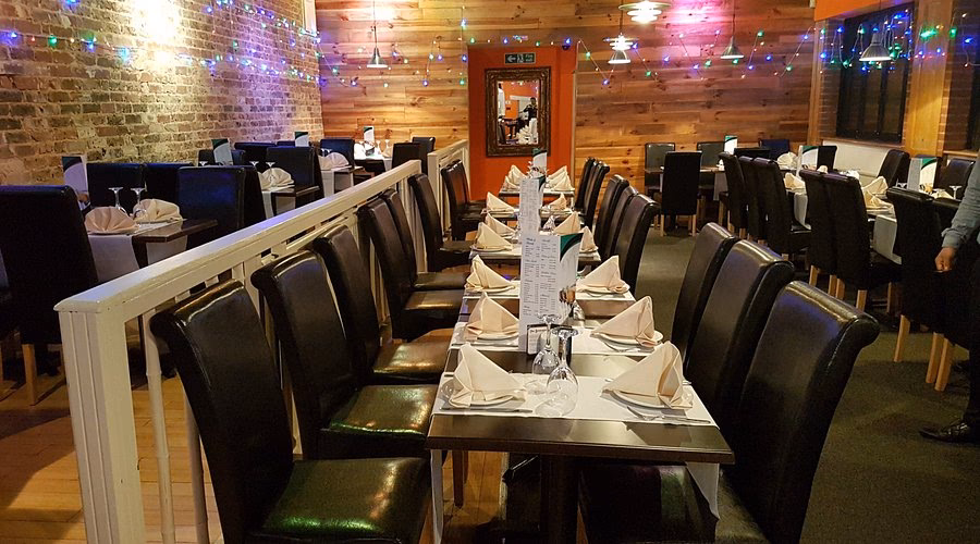 Why should you visit the masala club restaurant?