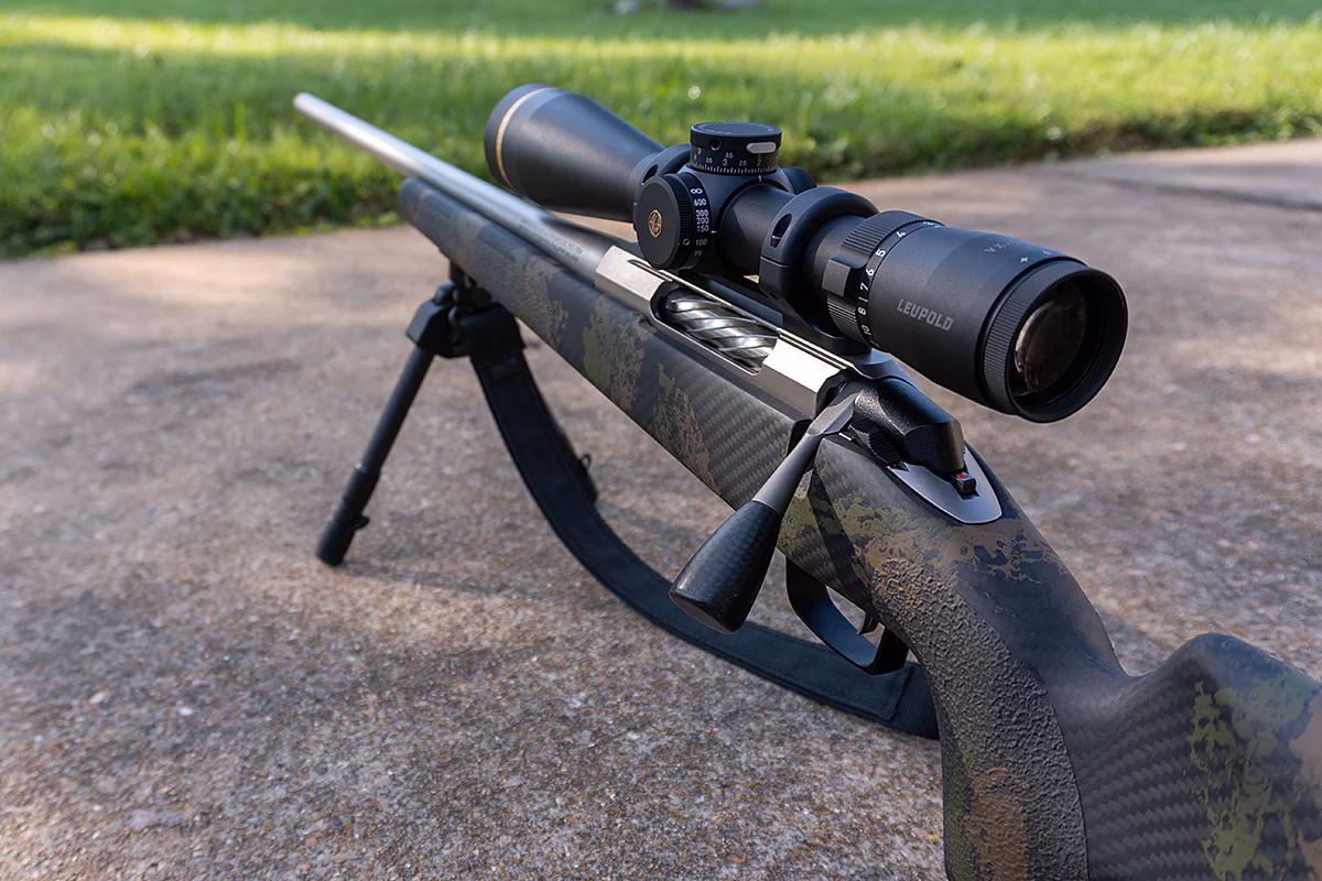 How do you remove a magazine from a Tikka rifle?