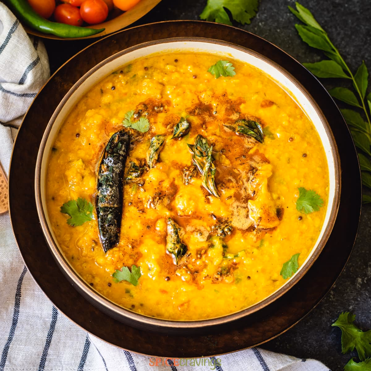 How to make golden yellow lentil dal with curry?