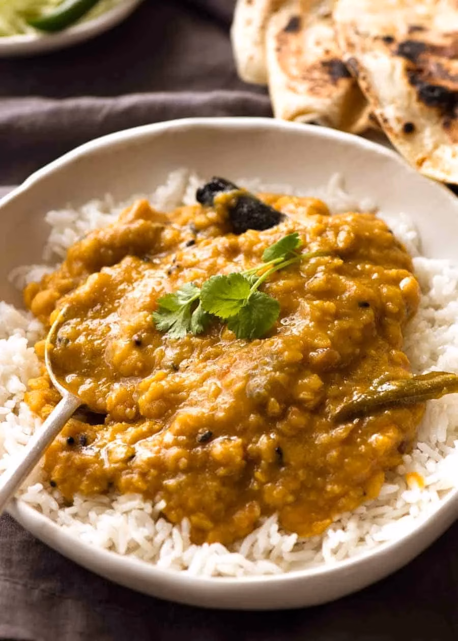 How to make golden yellow lentil dal with curry?